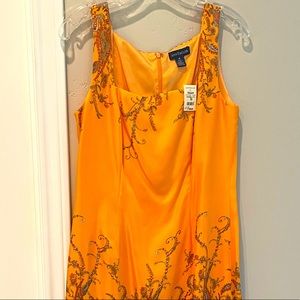 Beautiful Ann Taylor sleeveless silk dress.  Size 10.  Gorgeous & vibrant color!